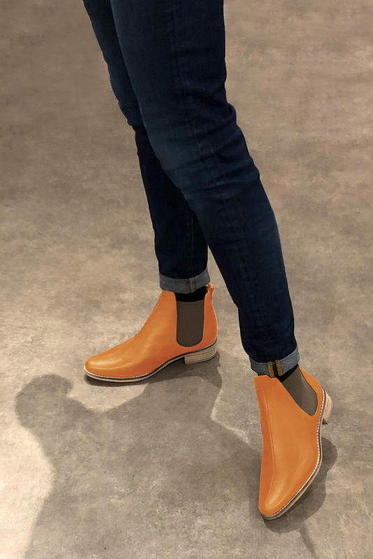 Apricot orange and taupe brown women's ankle boots, with elastics. Round toe. Flat leather soles. Worn view - Florence KOOIJMAN